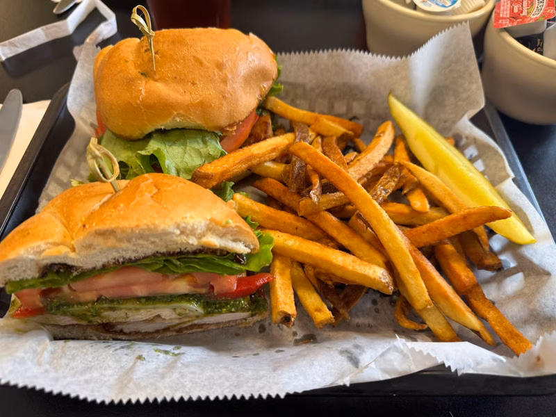 Burger with hand-cut fries in a basket